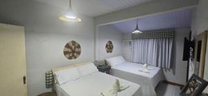 Ένα ή περισσότερα κρεβάτια σε δωμάτιο στο Casa Praia Completa Barra Grande Com Piscina +39 φωτογραφίες