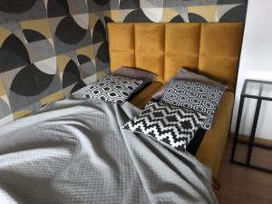 Posteľ alebo postele v izbe v ubytovaní Banialuka Apart