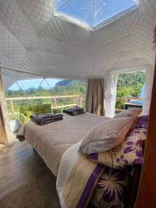 Postel nebo postele na pokoji v ubytování Milenaria Glamping