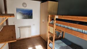 Postel nebo postele na pokoji v ubytování Ostello ValGrande