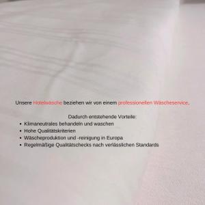 Fotografie z fotogalerie ubytování FeWo 20 - Appartement im Rottalblick - YoungModern wohnen, Tiere willkommen, Bademantelgang zur Therme, TV und Balkon v destinaci Bad Griesbach