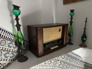 En eller flere senge i et værelse på Panoramic kasbah home