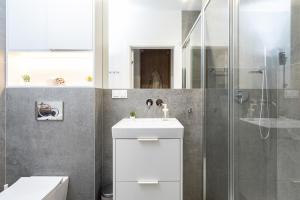 Kúpeľňa v ubytovaní SuperApart Domaniewska apt 53