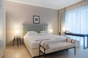 Letto o letti in una camera di Hotel Spiess & Spiess