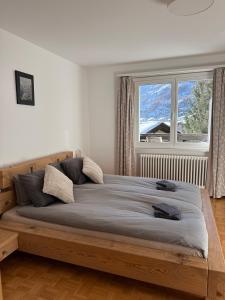 Postel nebo postele na pokoji v ubytování Apartment Snowball, Modern, cosy, Matterhorn views