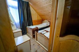 Postel nebo postele na pokoji v ubytování Hotel Voisa/სასტუმრო ვოისა