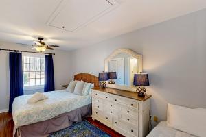 Ένα ή περισσότερα κρεβάτια σε δωμάτιο στο Sundown Bed and Beach