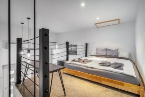 Posteľ alebo postele v izbe v ubytovaní Urban Loft Haven near Astoria