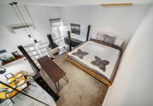 Posteľ alebo postele v izbe v ubytovaní Urban Loft Haven near Astoria