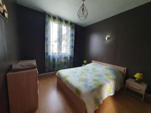 Postel nebo postele na pokoji v ubytování Nat'Autry
