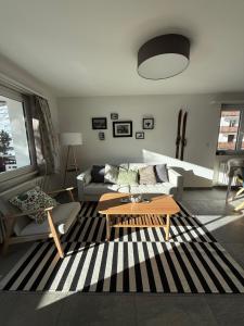 Posezení v ubytování Apartment Snowball, Modern, cosy, Matterhorn views