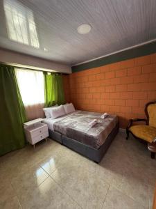 Katil atau katil-katil dalam bilik di Casa Familiar de la villa +8 gambar