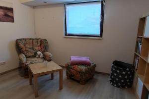 Ruang duduk di Ferienwohnung Buddy +3 gambar