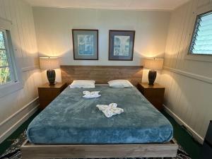 Voodi või voodid majutusasutuse Wild Ginger Hotel toas