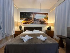 Voodi või voodid majutusasutuse Wild Ginger Hotel toas