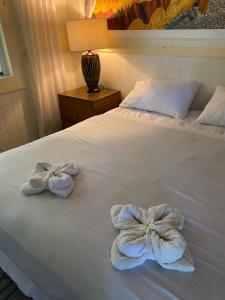 Voodi või voodid majutusasutuse Wild Ginger Hotel toas