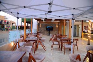Restoran või mõni muu söögikoht majutusasutuses Maktub Pyramids Hotel