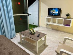 Et tv og/eller underholdning på Apartamento Anau- Playa - Yumbo + 36 billeder