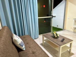 Et opholdsområde på Apartamento Anau- Playa - Yumbo