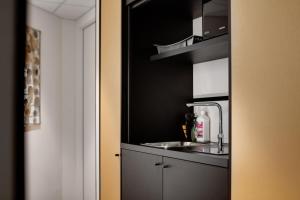 Cucina o angolo cottura di Hôtel & Résidence Octel