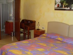 Postel nebo postele na pokoji v ubytování B&B Frammenti D'Itria