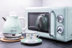 Kohvi ja tee valmistamise võimalus majutusasutuses Morgenlicht Apartment