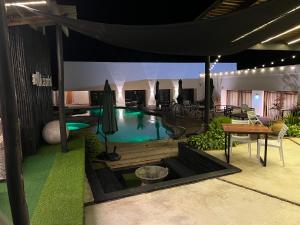 Nkanhi Centro de Conferências e Hotel 내부 또는 인근 수영장