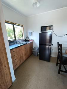 Kuchyň nebo kuchyňský kout v ubytování Moeraki Beach Motels + 17 fotografií