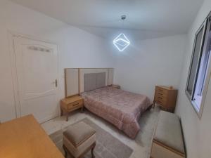 Postel nebo postele na pokoji v ubytování Appartement hannibal