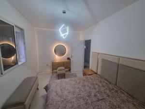 Postel nebo postele na pokoji v ubytování Appartement hannibal