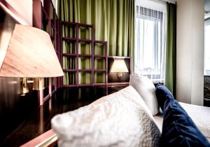 Postel nebo postele na pokoji v ubytování Hotel Mirage Düsseldorf-Neuss