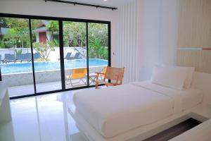 Letto o letti in una camera di Ton Sai Tropical Phi Phi Island