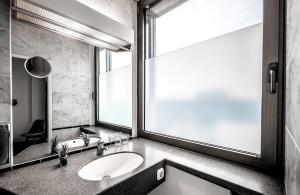 Koupelna v ubytování Hotel Mirage Düsseldorf-Neuss