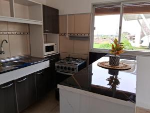 Η κουζίνα ή μικρή κουζίνα στο Casita en Florida