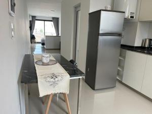 Η κουζίνα ή μικρή κουζίνα στο Departamento 42 - Mural Home