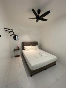 Letto o letti in una camera di TDOZE Hotel