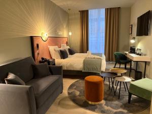 Postel nebo postele na pokoji v ubytování Hôtel Mercure Montauban + 37 fotografií