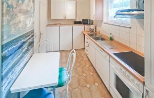 Kuchyň nebo kuchyňský kout v ubytování Ferienwohnung Plau Am See