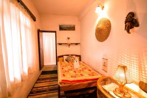Postel nebo postele na pokoji v ubytování Peace Eye Guest House