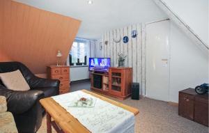 TV a/nebo společenská místnost v ubytování Ferienwohnung Waren Müritz