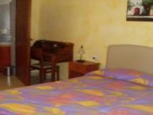 Postel nebo postele na pokoji v ubytování B&B Frammenti D'Itria