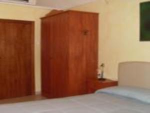 Postel nebo postele na pokoji v ubytování B&B Frammenti D'Itria