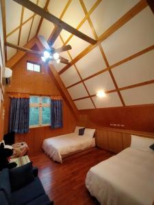 En eller flere senger på et rom på Haowangjiao Homestay