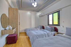 Postel nebo postele na pokoji v ubytování Cairo Central & modern apartment