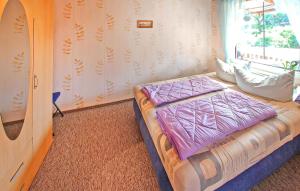 Postel nebo postele na pokoji v ubytování Ferienhaus Waren Müritz