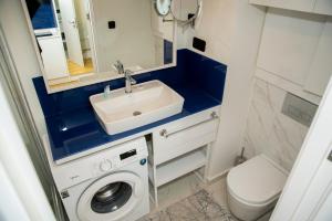 Koupelna v ubytování VIP APARTmENTS N2