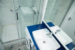 Koupelna v ubytování VIP APARTmENTS N2