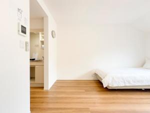 Postel nebo postele na pokoji v ubytování 池袋本町-池袋新房北池袋车站5分钟 一室二张床