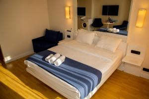 Postel nebo postele na pokoji v ubytování VIP APARTmENTS N9