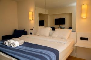 Postel nebo postele na pokoji v ubytování VIP APARTmENTS N9